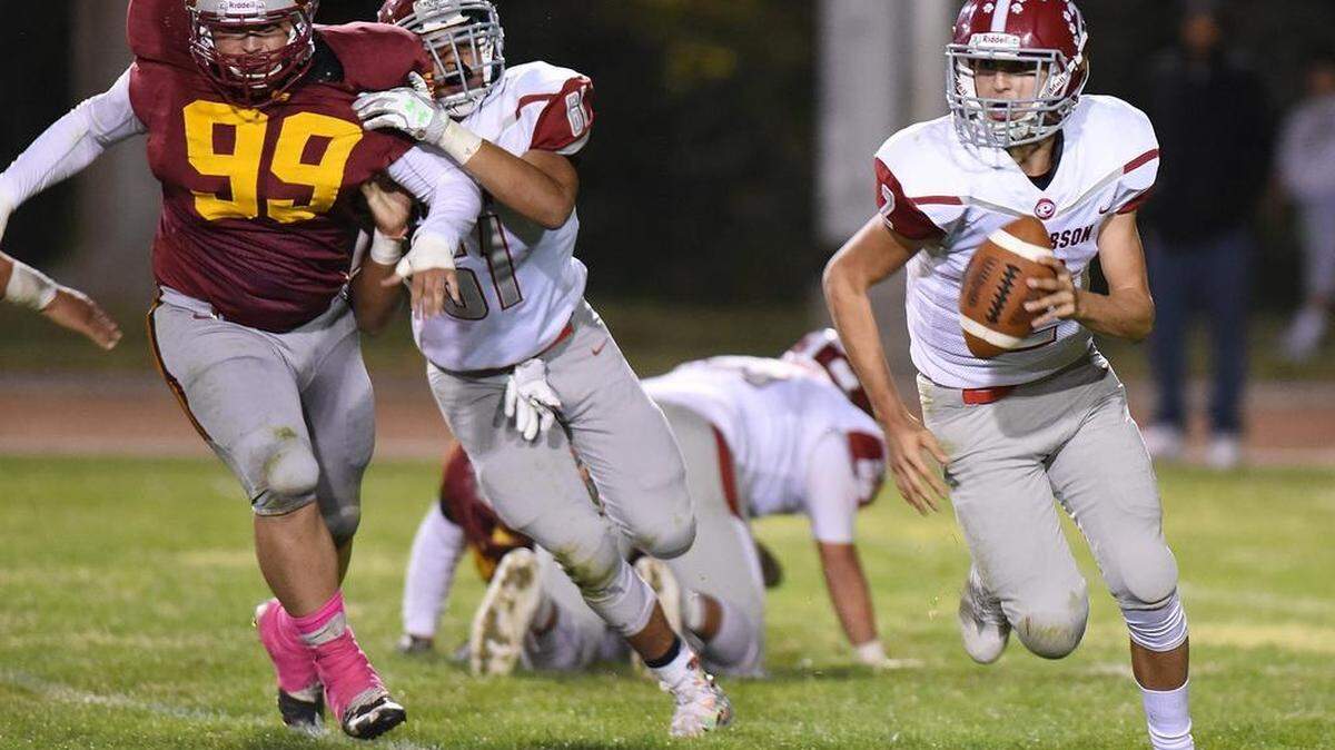 Patterson quarterback, Gabe Sanchez looks for an open receiver in the fourth quarter Fri., Oct. 20, 2017 at Loftin Stadium in Los Banos.
