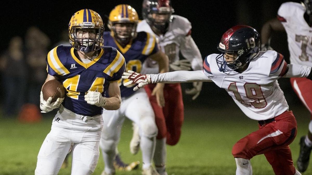Escalon's Elliott Mello breaks free for a first half touchdown run during the Trans-Valley League game with Modesto Christian at Escalon High School in Escalon, Calif., on Friday, Oct. 27, 2017. Escalon won the game 37-14.