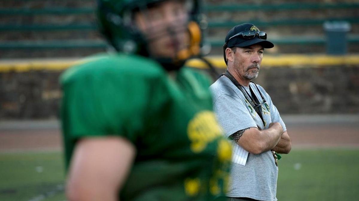 
Sonora coach Bryan Craig watches offensive drills during practice at Sonora High School in 2014. Sonora returns three of its top six rushers from a year ago as it faces rival Oakdale on Friday.
