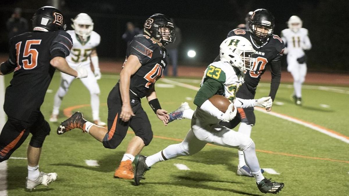 Hilmar runningback Isaac Sharp breaks free for a touchdown run in the second quarter during the first round Division 5 Sac-Joaquin playoff game with Summerville in Summerville, Calif., on Friday, Nov. 10, 2017.
