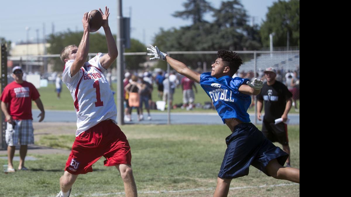 
East Union receiver Austin Miller makes a game winning touchdown catch in a game between East Union and Sierra during the MJC Passing Tournament at Modesto Junior College in Modesto on July 11, 2015 
