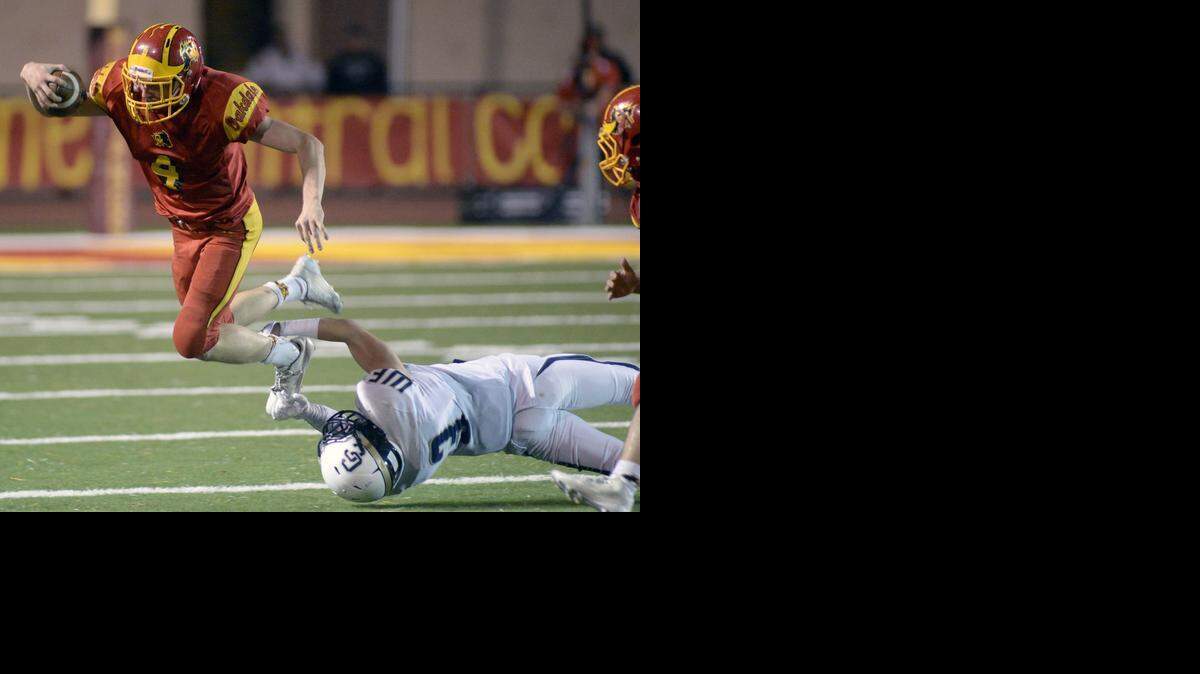 
Oakdale running back Brock Whiting gets tripped by a Central Catholic defender during a game between Oakdale and Central Catholic on November 7th in Oakdale.
