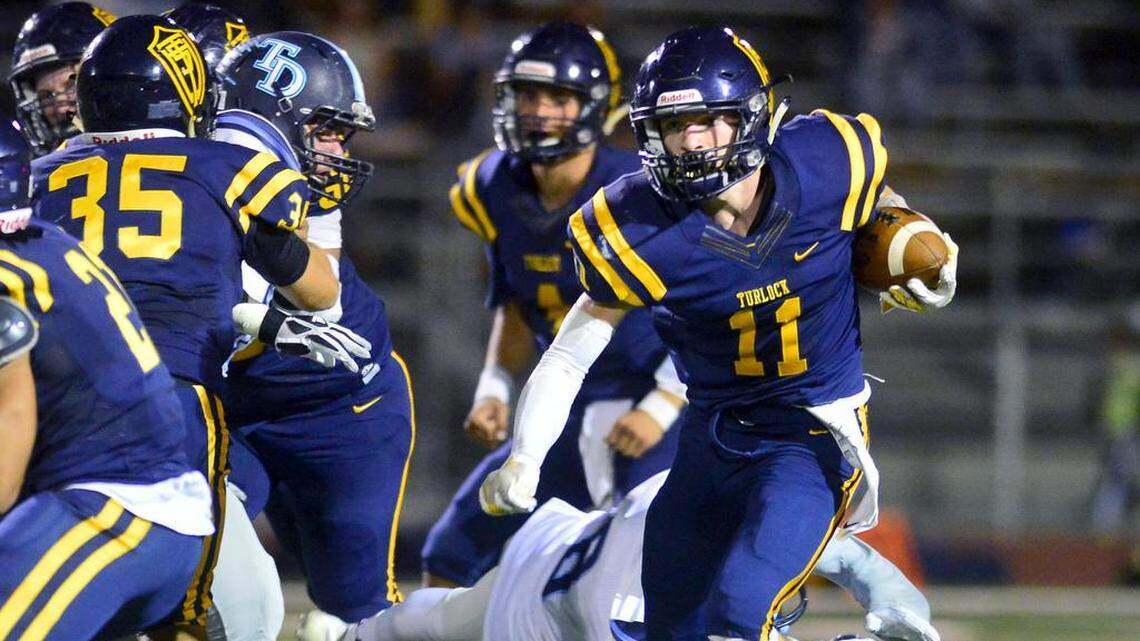 Turlock receiver sprints up field on a jet sweep during a game between Downey and Turlock in at Turlock High School in Turlock California on September 28, 2018.