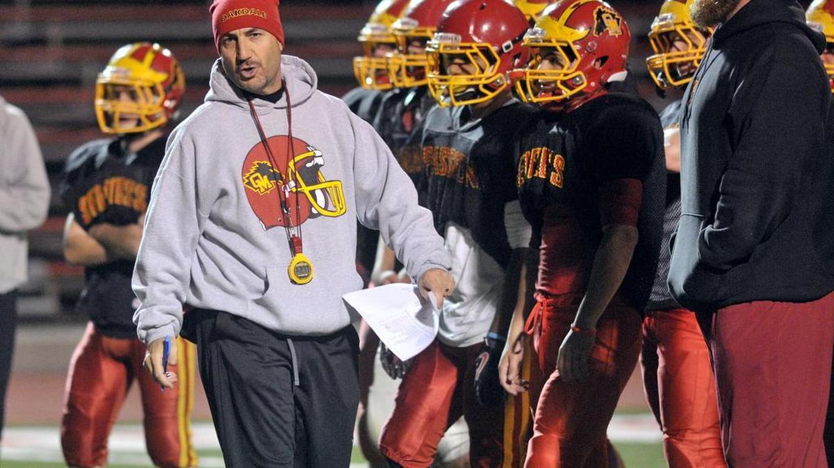 
Oakdale football coach Trent Merzon, seen running a practice in 2012, says his team will “move forward” after the Sac-Joaquin Section stripped the Mustangs of six practices for violating contact rules.
