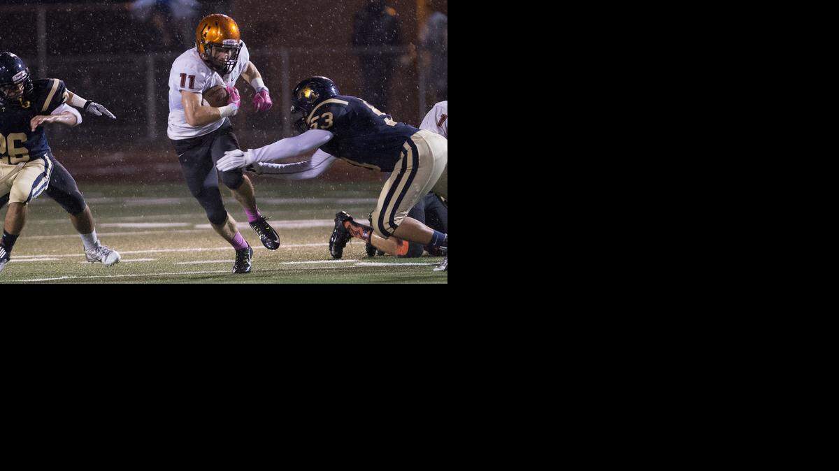 
Merced High’s Nick Camper returns a punt during the Central California Conference game with Turlock in Turlock, Calif., on Friday, October 31, 2014.
