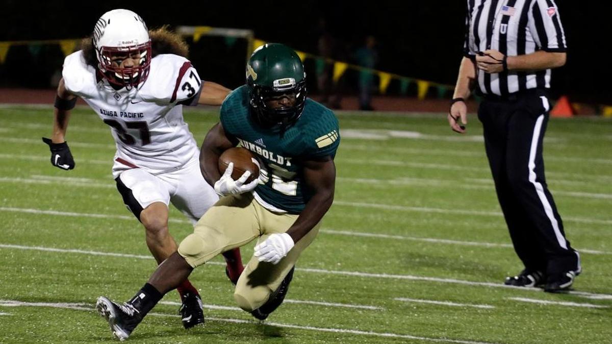 Humboldt State’s Ja’Quan Gardner, a former Central Valley High of Ceres standout and 2014 graduate, rushes for yardage against Azusa Pacific University in 2014. In 2017, he finished with 1,259 yards and became a Harlon Hill Award nominee.