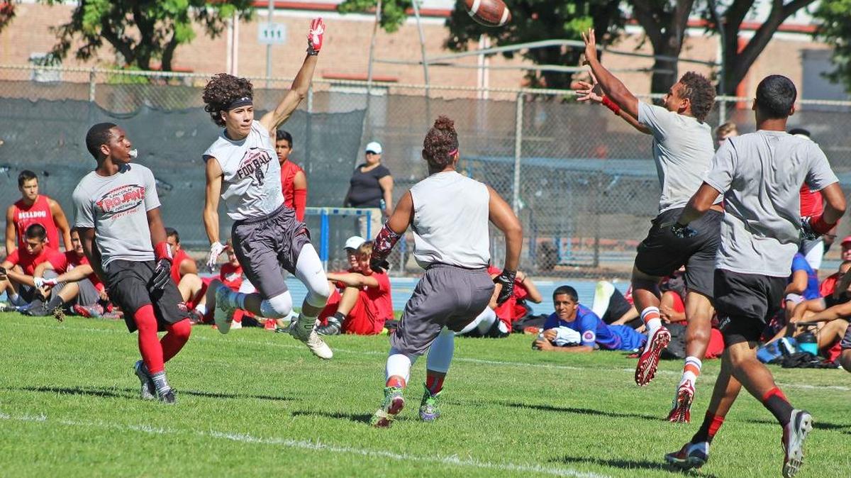 The Modesto High football team competes against Lincoln of Stockton at the 10th annual Modesto Junior College Passing Tournament on Saturday, July 9, 2016, at Pirate Stadium.