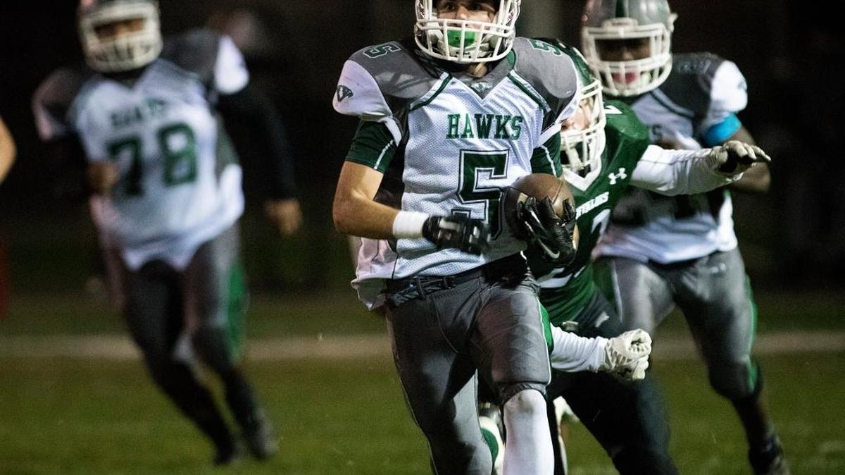Central Valley’s Moses Ghiorso (5) runs for a 87-yard touchdown during the first round D-III Sac-Joaquin Section game with Manteca in Manteca on Nov. 13, 2015.