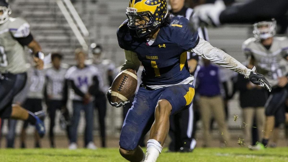 Marcello Longstreth (1) of Gregori High looks for a hole and a few more yards. Franklin of Elk Grove traveled to Gregori High for round 1 of playoffs Thursday, Nov. 9, 2017.