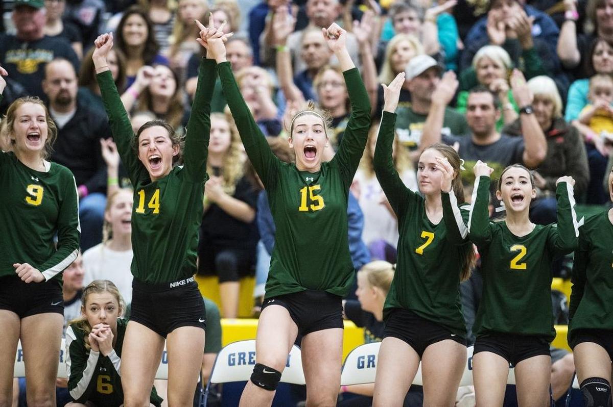 The Hilmar bench reacts after winning the first game of a Sac-Joaquin Section Division IV Championship match against Bret Harte at Gregori High School in Modesto, Calif., on Saturday, Nov. 11, 2017. The Yellowjackets beat the Bullfrogs 3-0.