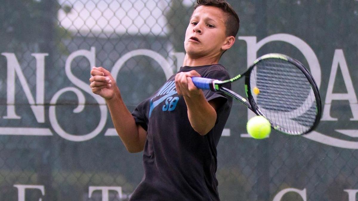 Modesto High's Coby McCaig swings through a forehand during his three-set victory over Beyer's Ryan Lewis in the Sac-Joaquin Section Division I tennis match in Roseville, Calif., on Friday, May 6, 2016.