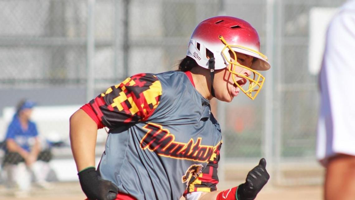 Oakdale senior Maddi Hackbarth celebrates a third-inning home run off Sierra pitcher Lindsey Walljasper on Tuesday, April 6, 2016. Hackbarth’s blast also scored Grace Green, who led off the inning with a single.