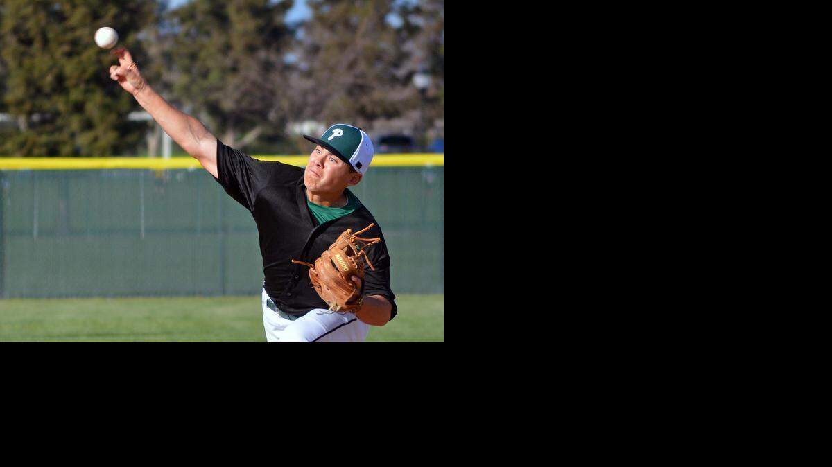 
Pitman High Schools Josh Hernandez throws a pitch during his team's 5-4 victory over Modesto on Friday, Feb. 27, 2015, in Turlock, CA. 
