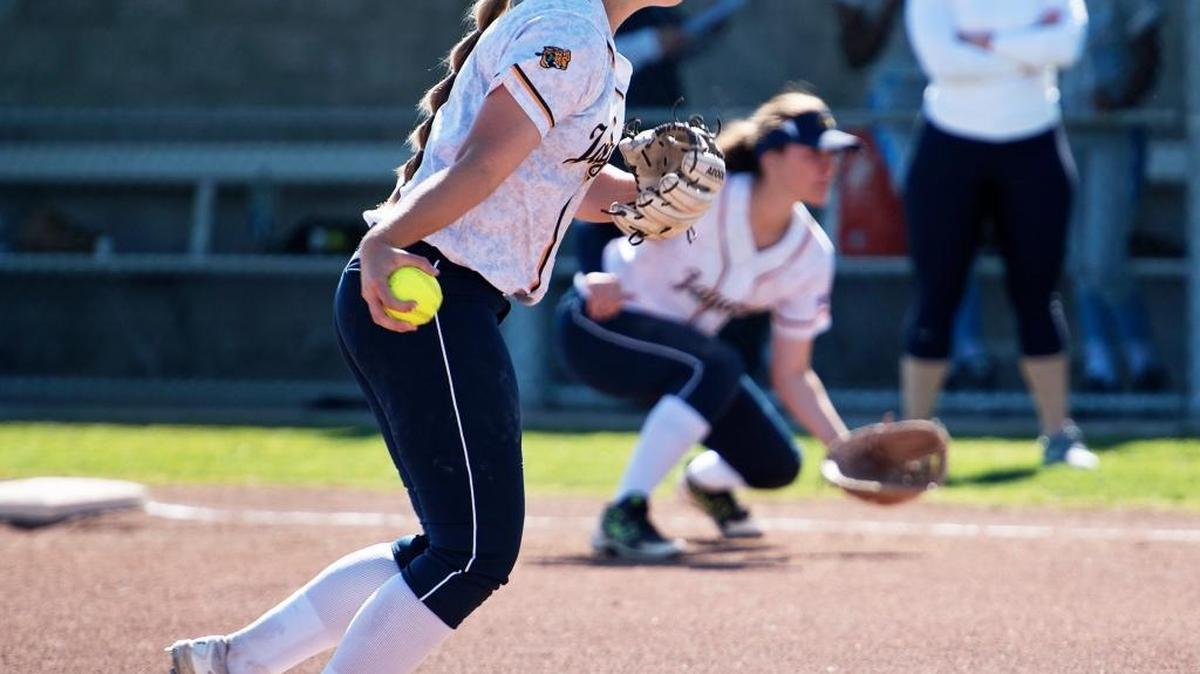 Gregori pitcher McKyla Nelson winds up to pitch during the Modesto Metro Conference game with Downey in Salida, Calif., on Tuesday, March 28, 2017.