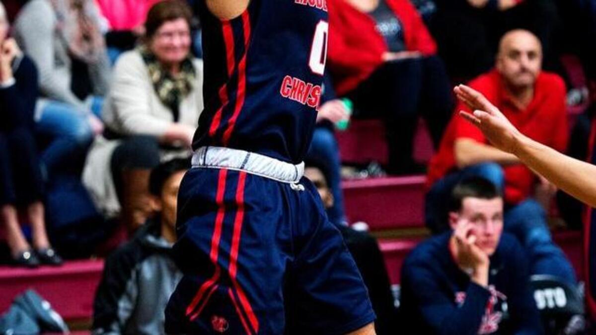 Modesto Christian’s Darrian Grays sinks a three-point shot during the Modesto Metro Conference game with Modesto at Modesto High School in Modesto, Calif., Wednesday, Jan. 11, 2017. Modesto Christian won the game 80-68