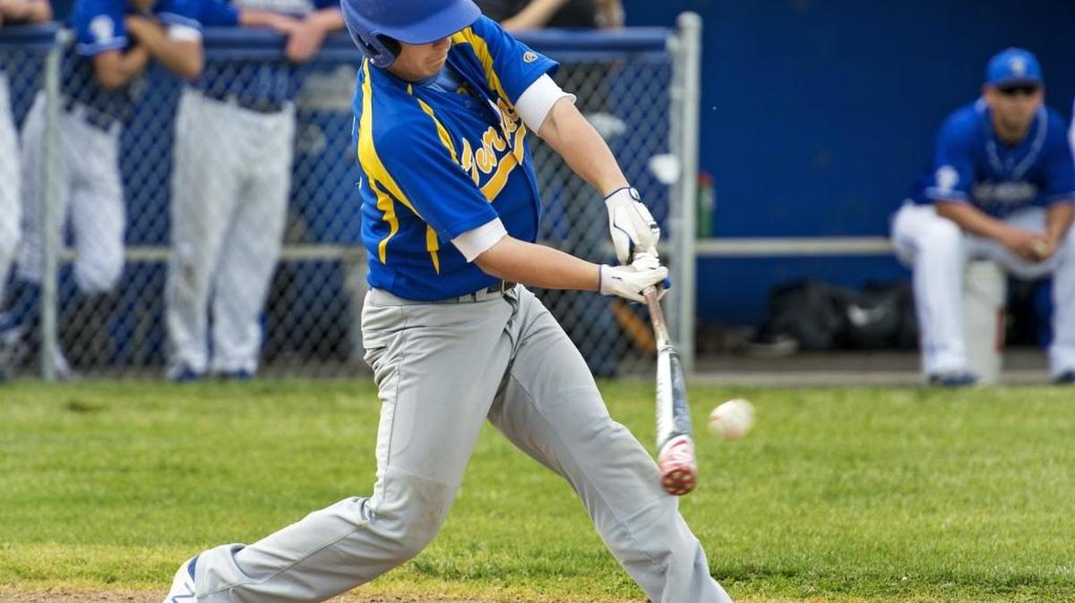 Turlock’s Tyler Etharidge connects for a double in the first inning of Wednesday's game with Sierra game at Sierra High School in Manteca, Calif., on March, 15, 2017.