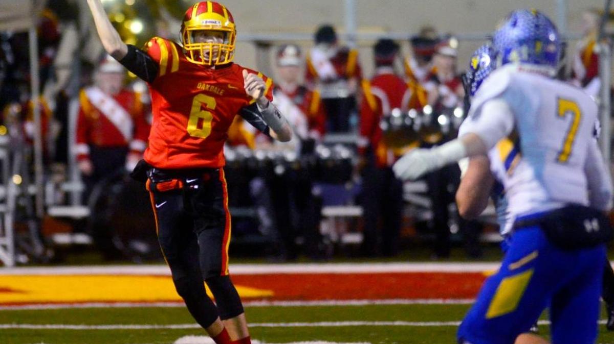 Oakdale quarterback Marc Dickson throws a pass down field during the Division 3-A NorCal Championship Game where Oakdale defeated Sutter 27-10 at Oakdale High School in Oakdale California on Dec. 10, 2016.