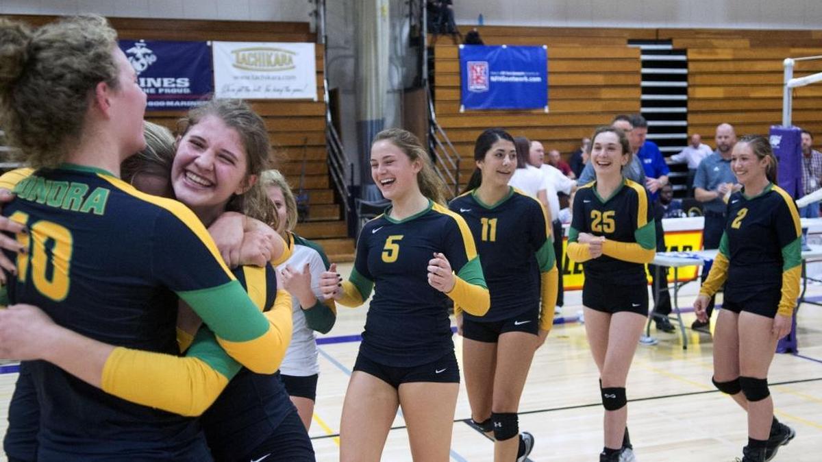 Sonora players celebrate winning Sac-Joaquin Section Division IV Championship match between Sonora High School and Hilmar High School at Tokay High School in Lodi, California on November 21, 2015.