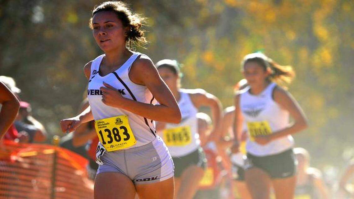 
Riverbank’s Haley Richardson in the Girls Division IV, during the 2014 CIF State Cross Country Championships at Woodward Park, Saturday morning. 

