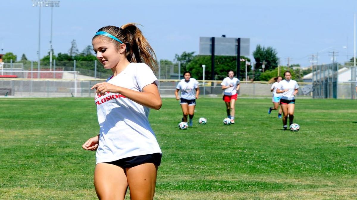 
Ashley Arnett, who is tied for the state lead in goals with 41, warms up with her team at practice on Monday (5-11-15) in Oakdale. 

