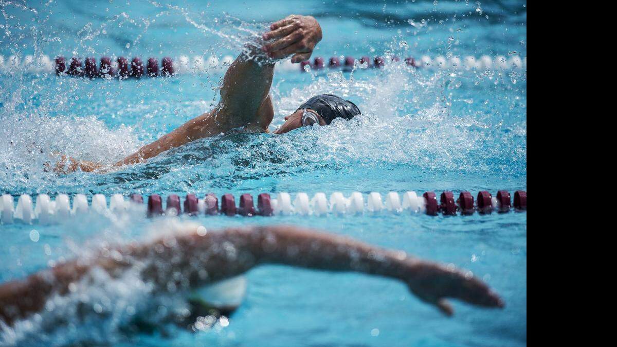 
Merced High’s Josh Fluetsch swims to victory in the 100 freestyle Saturday during the Central California Conference Swimming Championships.


