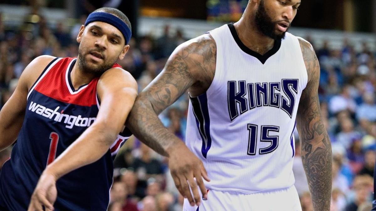 Washington Wizards forward Jared Dudley takes a little elbow from Sacramento Kings center DeMarcus Cousins on Wednesday, March 30, 2016 at Sleep Train Arena in Sacramento.
