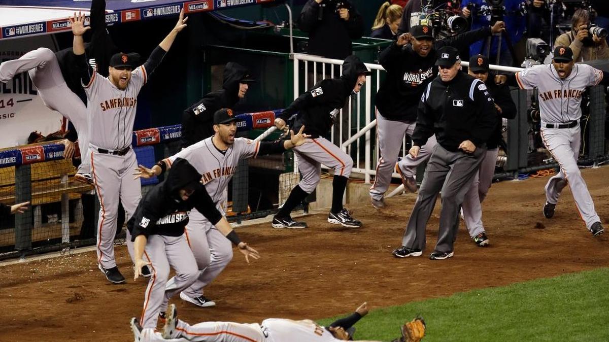 San Francisco Giants third baseman Pablo Sandoval celebrates after catching the final out in the ninth inning of Game 7 of baseball’s World Series against the Kansas City Royals Wednesday, Oct. 29, 2014, in Kansas City, Mo. No one is certain where that final-out ball is now.