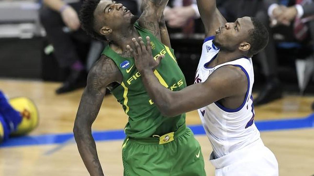 Oregon forward Jordan Bell (1) blocks the shot of Kansas forward Dwight Coleby (22) during the NCAA tournament’s Midwest Region final at the Sprint Center in Kansas City, Mo., on Saturday, March 25, 2017. Bell is the newest member of the Golden State Warriors after the NBA Draft on Thursday, June 22, 2017.