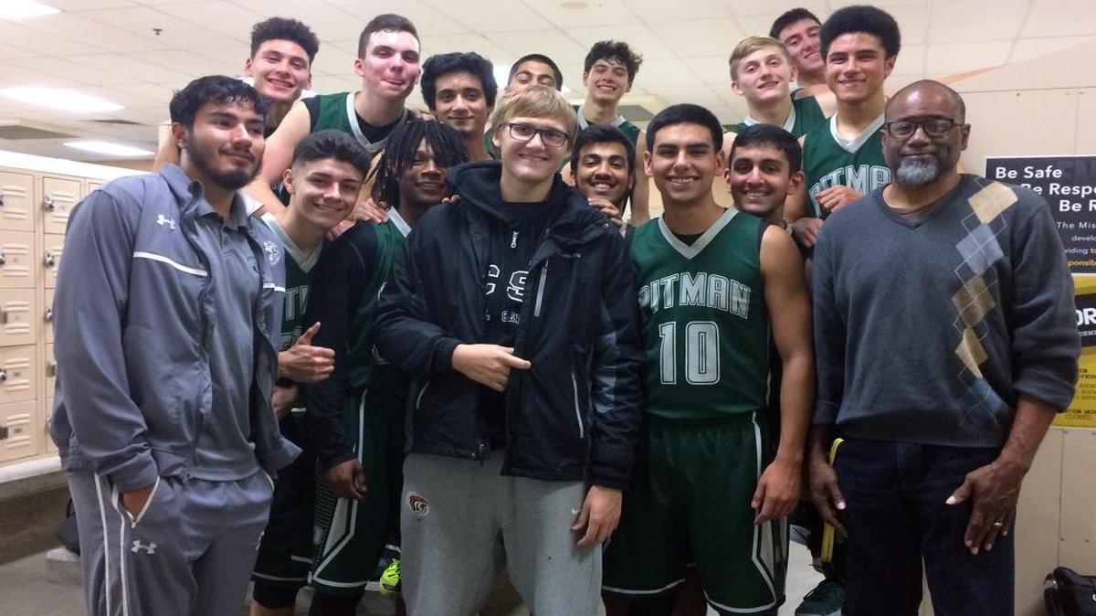 Jake Zylstra, center, and the Pitman High School basketball team are pictured Dec. 2 at the Modesto City Schools Tournament, the day after Jake was released from UCSF.