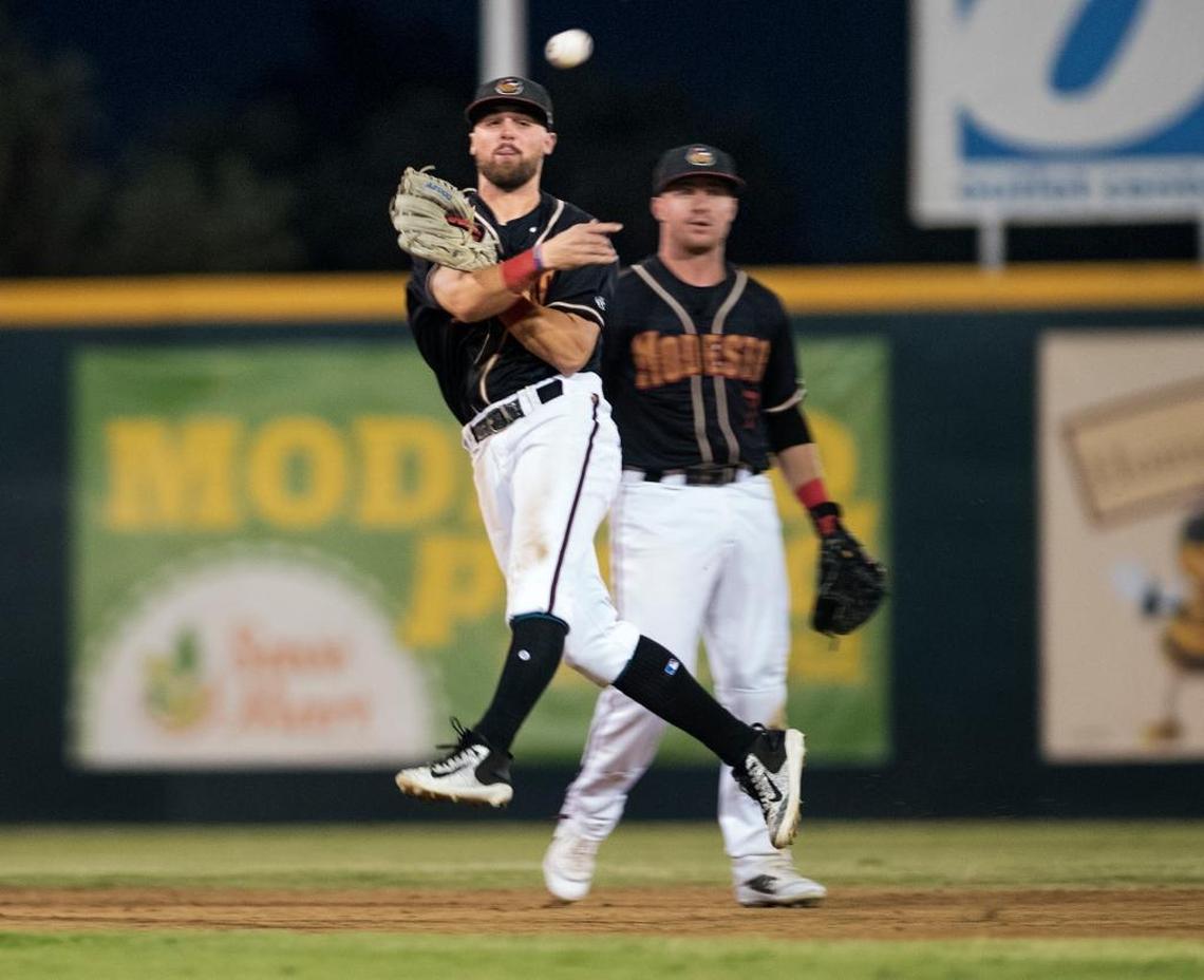 Modesto Nuts second baseman Jordan Cowan throws out a batter during the California League Championship game with Lancaster at John Thurman Field in Modesto, Calif., on Friday, September 15, 2017. Nuts won the game 8-1 and the series 3-0.