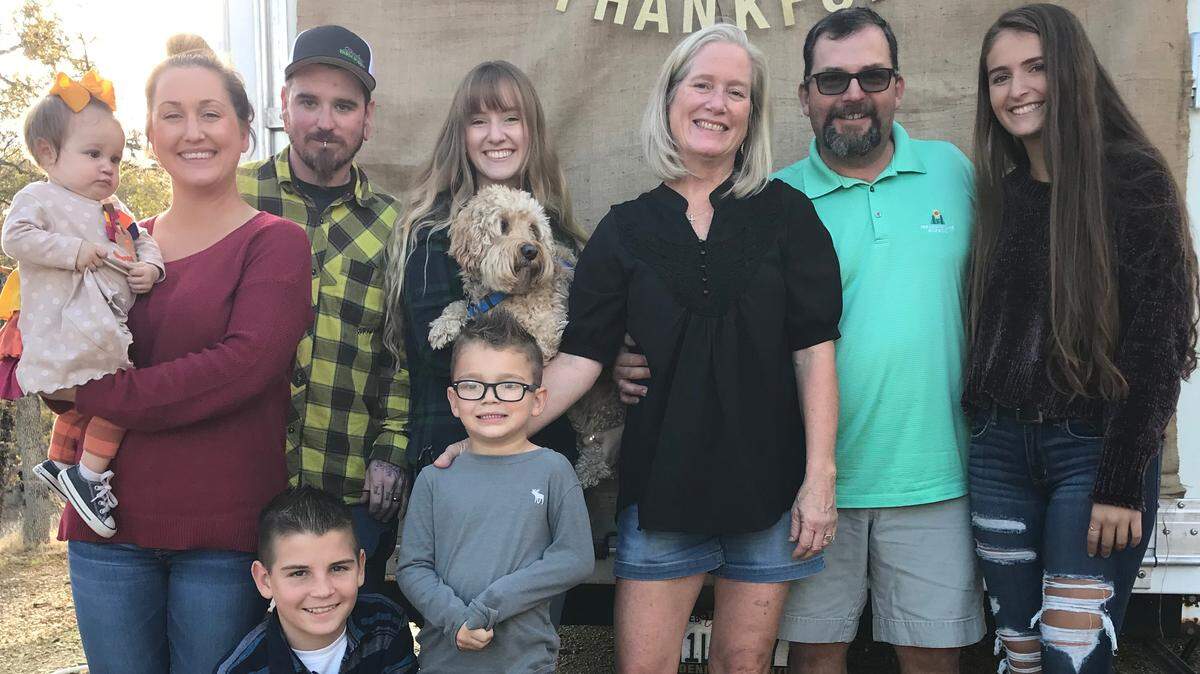 Gregori High assistant girls soccer coach Luke Molthen, second from the right, died Tuesday, Jan. 23, of a heart attack just hours befor the Jaguars' showdown with Modesto Metro Conference rival Enochs. Molthen, shown here clutching wife Sallie and surrounded by his children and grandchildren, was 50.