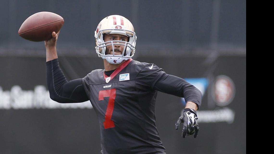 
San Francisco 49ers quarterback Colin Kaepernick throws the ball during NFL football practice, Thursday, May 21, 2015, in Santa Clara, Calif. (AP Photo/George Nikitin) 
