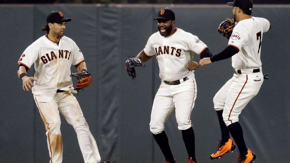 From left, San Francisco Giants outfielders Angel Pagan, Denard Span and Gregor Blanco celebrate after a 3-2 win over the Milwaukee Brewers during a baseball game Tuesday, June 14, 2016, in San Francisco. The Giants went 6-0 last week.