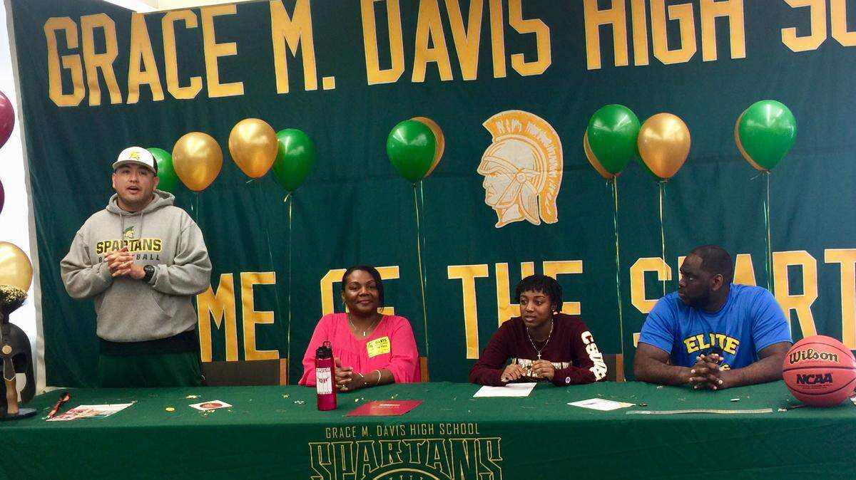 Grace Davis High senior Lea Anderson signed her national letter of intent to play basketball at Cal State University, Dominguez Hills, on Monday, Feb. 5, 2018. Anderson was joined at the head table by family and athletic director and coach Tim Garcia.