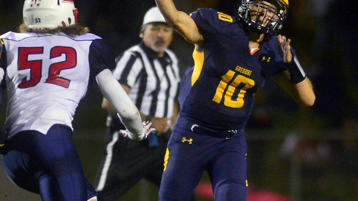 Gregory quarterback Bobby Avina throws a pass during a game between Gregori and Beyer at Gregori High School in Modesto California on September 23, 2016.