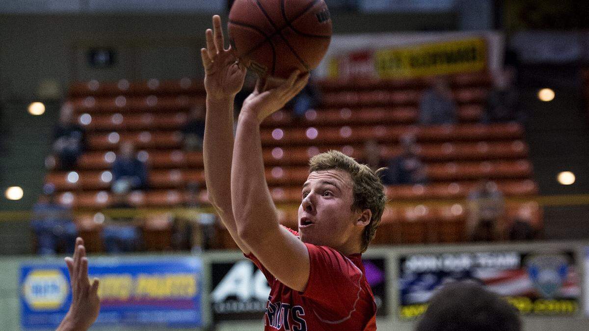 Beyer's Ben Polack attempts a jump shot during the Sac-Joaquin Section Division II final at University of the Pacific in Stockton, Calif., on Friday, March, 3, 2017. Whitney won the title 60-38.