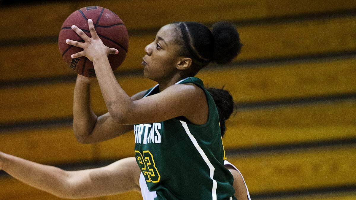 Davis' Lea Anderson shoots a running jumper during the Modesto Metro Conference game with Modesto Christian at Modesto Christian High School in Salida, Calif., Thursday, Jan. 5, 2017. Modesto Christian won the game 80-17.