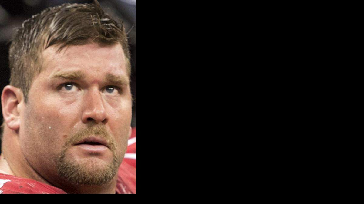  Justin Smith was in camp, presumably to speak to officials about his playing status.