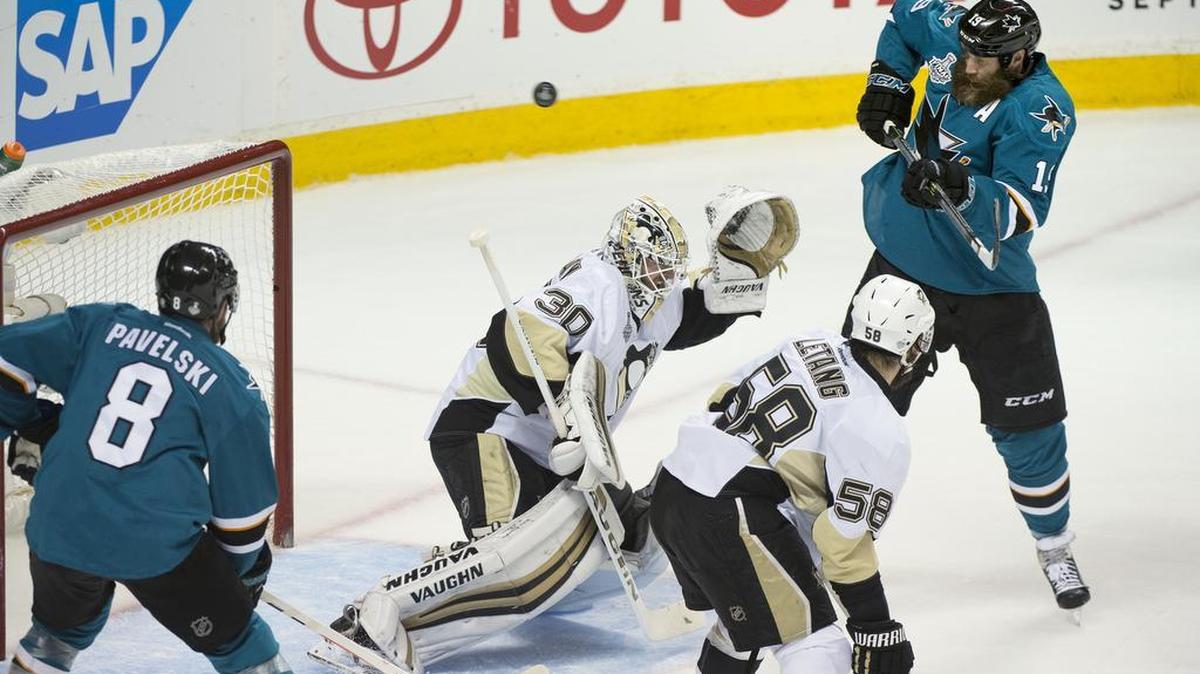 Pittsburgh Penguins goalie Matt Murray deflects a shot by San Jose Sharks center Joe Thornton in the first period of Game 4 of the Stanley Cup Final, Monday, June 6, 2016 in San Jose.
