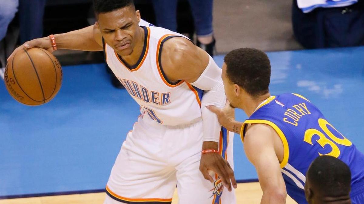 Oklahoma City Thunder guard Russell Westbrook (0) is defended by Golden State Warriors guard Stephen Curry (30) during Game 4 of the NBA basketball Western Conference finals in Oklahoma City, Tuesday, May 24, 2016. Westbrook had a triple double (36 points, 11 assists, 11 rebounds). Curry scored 19 points on 6-of-20 shooting, including 2 of 10 from three-point range.